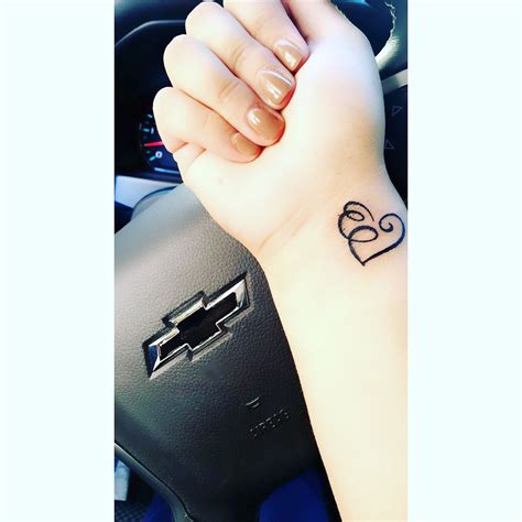 Beautiful Tattoo Designs for the Letter E with a Heart